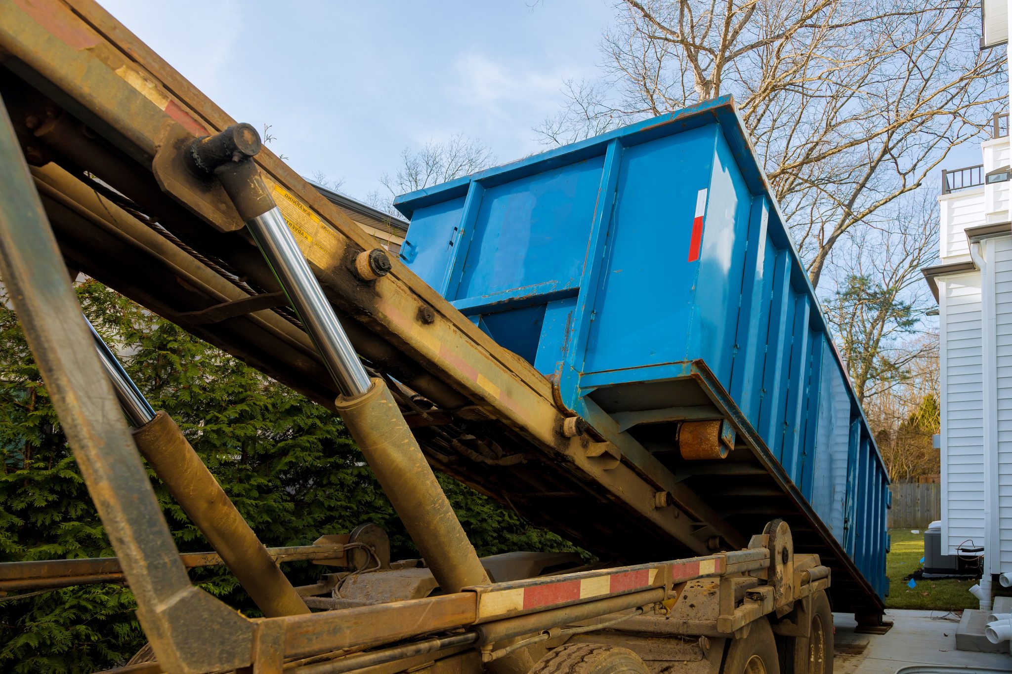 unloading-empty-dumpster-2021-09-04-10-28-58-utc-2048x1365.jpg